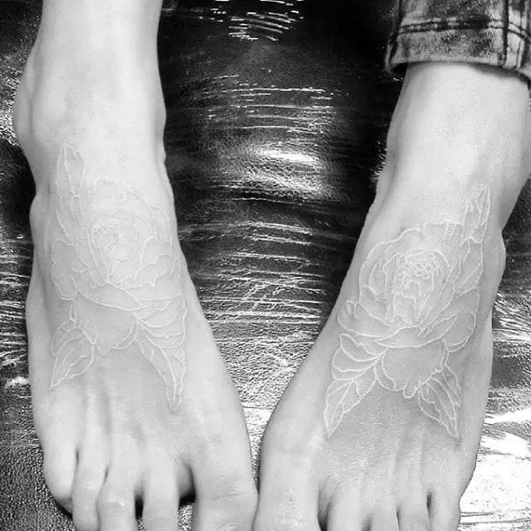foot-tattoo-of-white-ink-roses-on-gentleman
