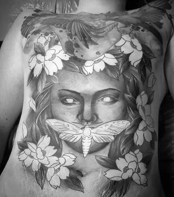 full-chest-negative-space-moth-mens-female-portrait-tattoos