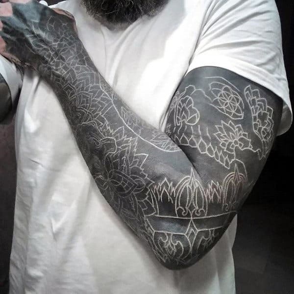 gentleman-with-white-ink-over-blackwork-tattoo-sleeve