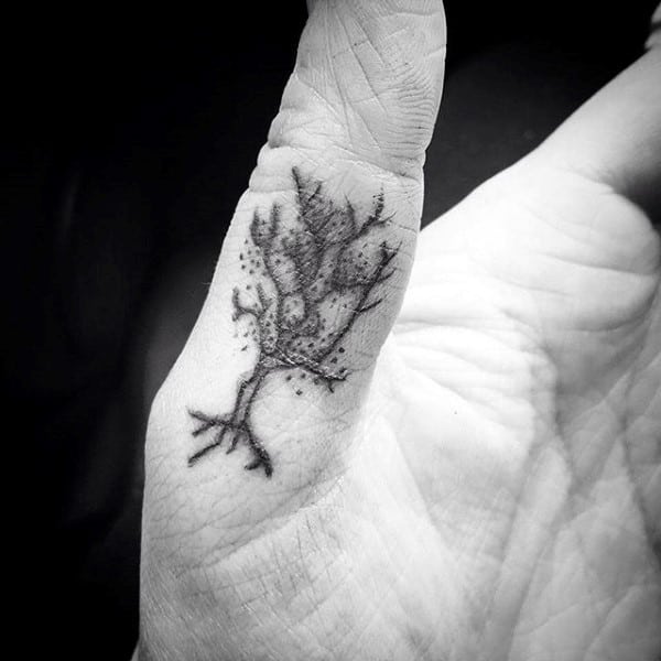 guy-with-tree-thumb-tattoo