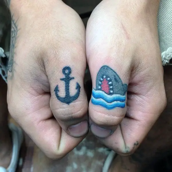 guys-thumb-tatto-of-anchor-and-shark