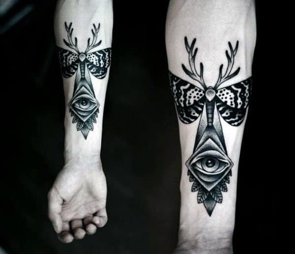 inner-forearm-eye-with-moth-masculine-male-tattoo-ides