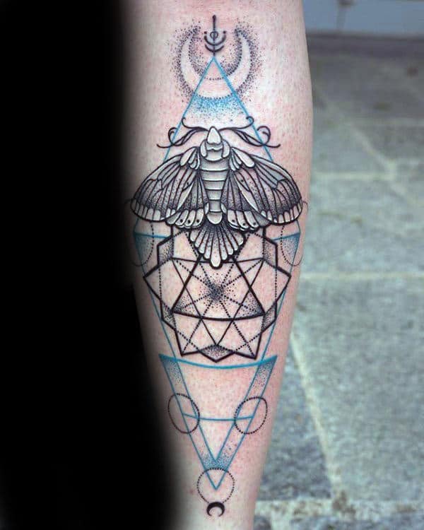mens-geometric-moth-forearm-tattoo-ideas-with-blue-and-black-ink-design