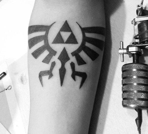 gentleman-with-triforce-zelda-symbol-tattoo-on-forearm