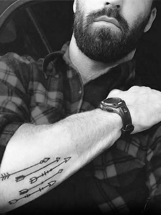 guys-tattoos-with-small-arrow-design-outer-forearm