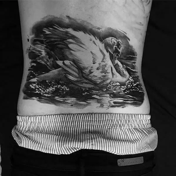 lower-back-male-swan-tattoo-design-inspiration