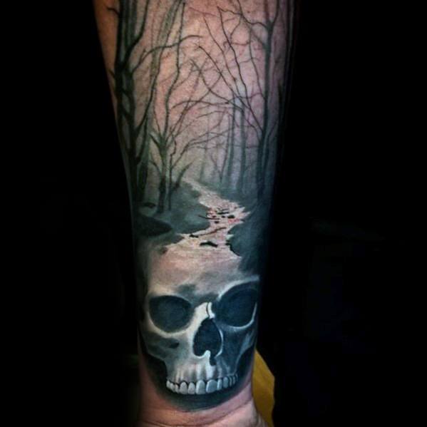 male-tattoo-with-skull-head-river-design-on-inner-forearm