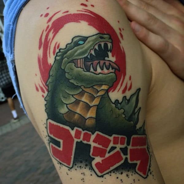 modern-japanese-style-tattoo-with-godzilla-on-mans-bicep