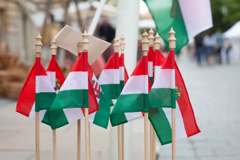 flags of Hungary in a souvenir shop at a city festival