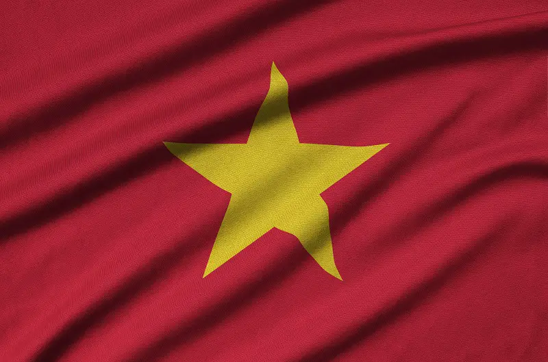 Vietnam flag is depicted on a sports cloth fabric with many folds. Sport team banner