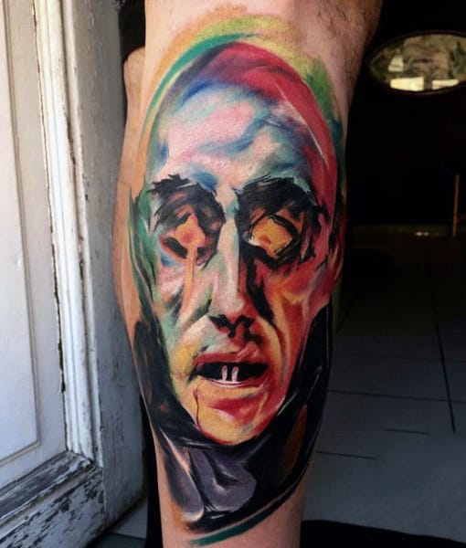 abstract-mens-vampire-tattoo-in-full-color-on-leg