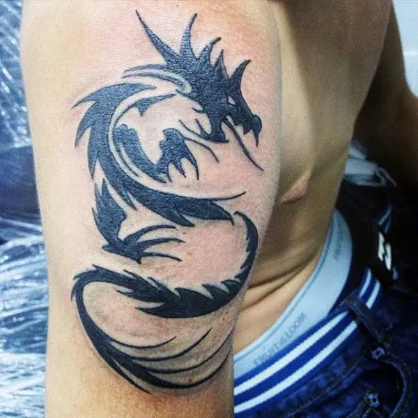 tribal dragon back tattoos for men