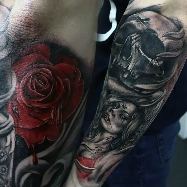 below-elbow-vampires-tattoos-for-men-with-red-rose-and-black-ink
