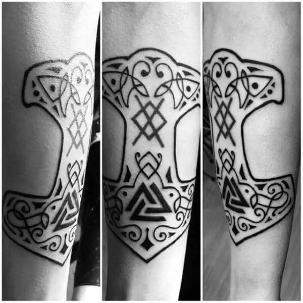 black-ink-outline-mjolnir-tattoos-for-guys-on-inner-forearm
