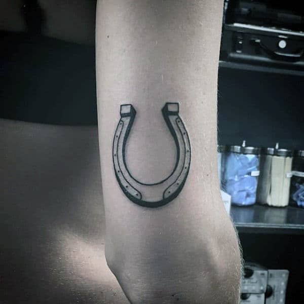 black-ink-outline-tricep-horseshoe-tattoos-for-men