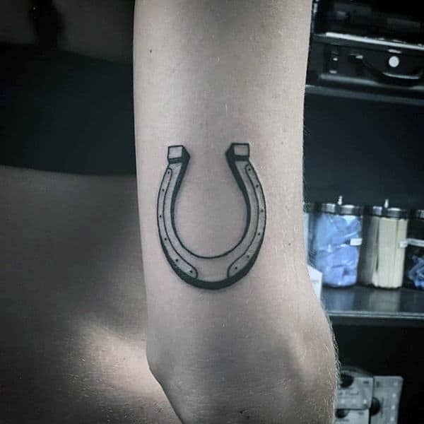 horseshoe tattoo with wings