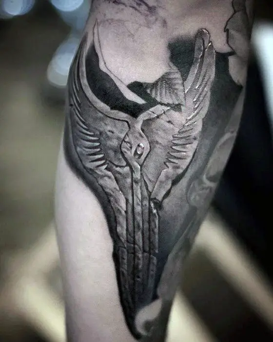 Can anyone translate the lettering  really thinking of getting this cause  of the representation Valkyrie wings have  rTattooDesigns