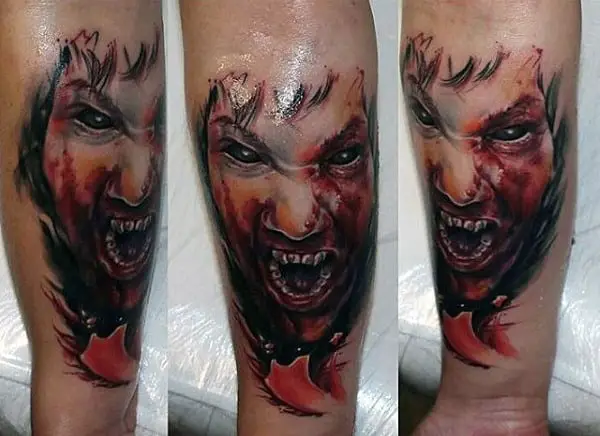 cool-mens-wrist-biting-red-vampire-tattoos