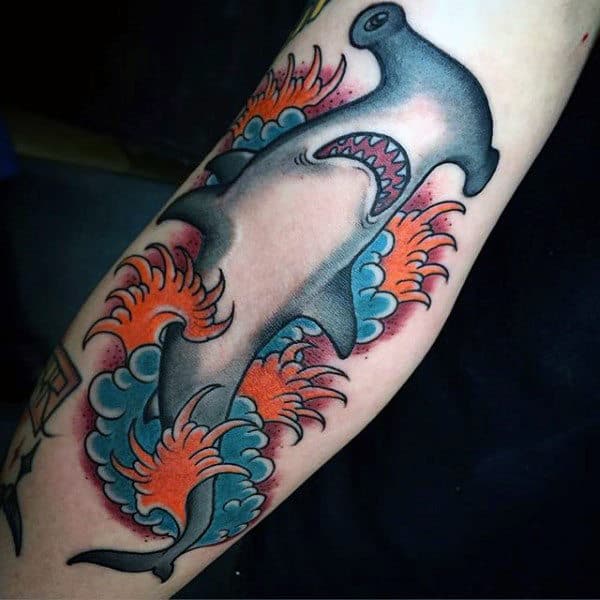 Microrealistic hammerhead shark tattoo on the forearm