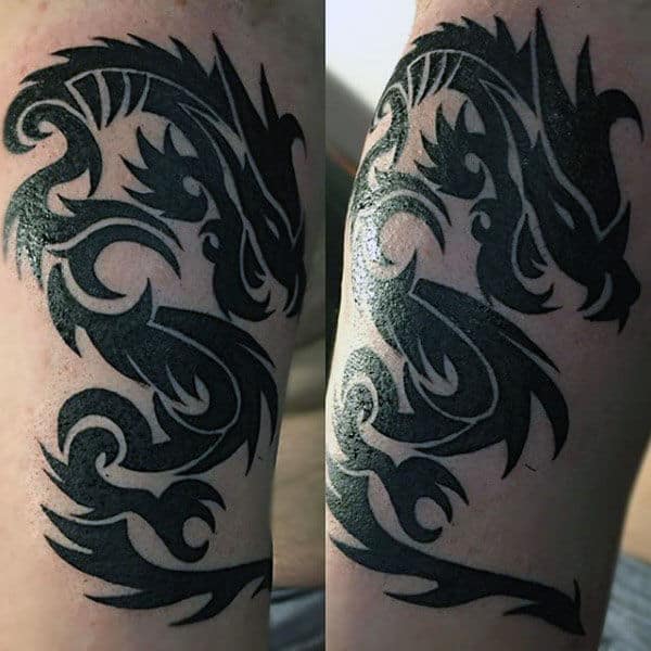 creative-tribal-dragon-tattoos-for-guys