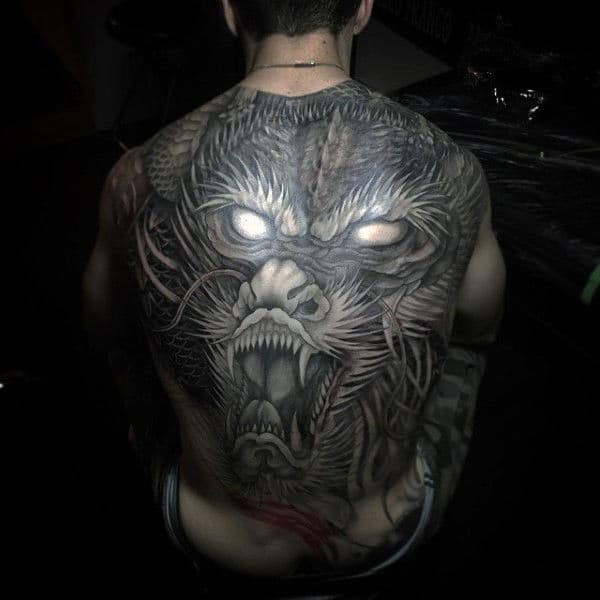 detailed-realistic-glowing-white-eyes-mens-dragon-back-tattoos