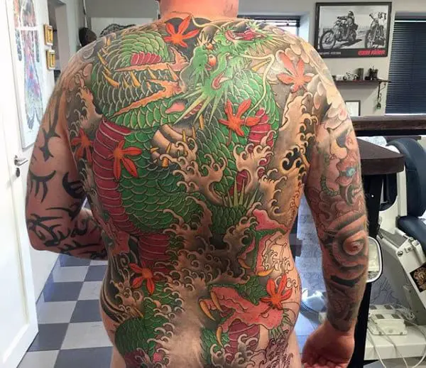 guys-green-japanese-dragon-back-tattoos