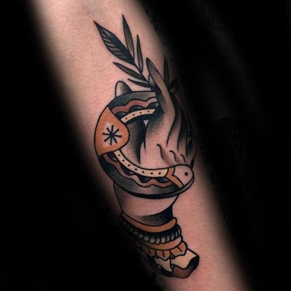 hand-holding-horseshoe-traditional-guys-forearm-tattoos