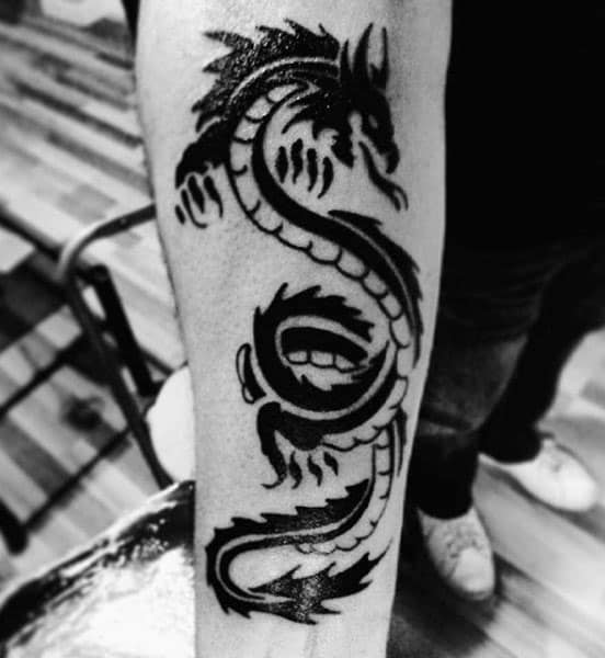 inner-forearm-traditional-tribal-dragon-guys-tattoos