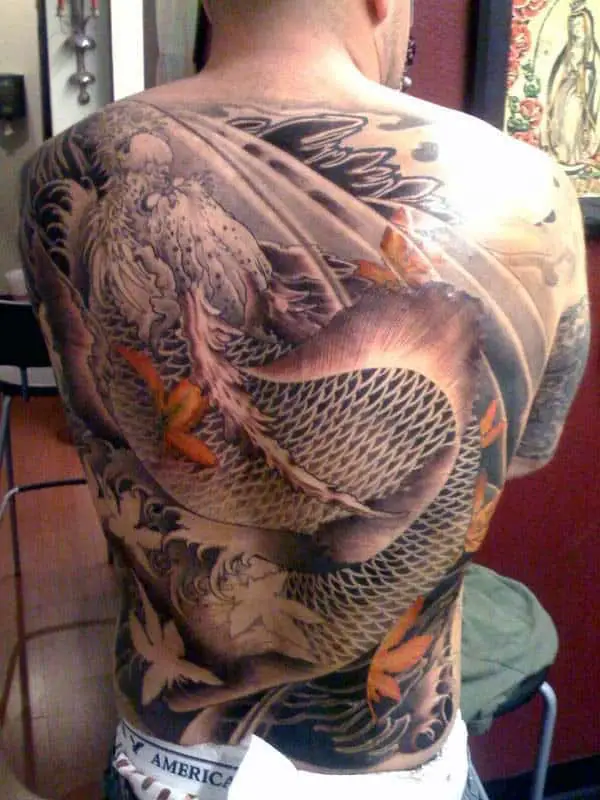 japanese-orange-leaf-dragon-mens-back-tattoo