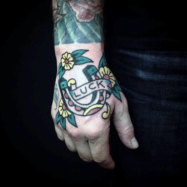 luck-horseshoe-floral-mens-hand-tattoos