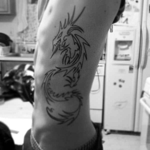 manly-tribal-dragon-tattoos-for-men-ribcage