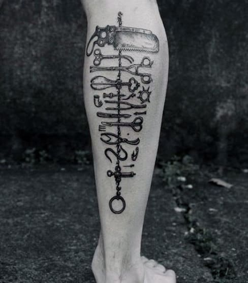 male-with-calf-tattoo