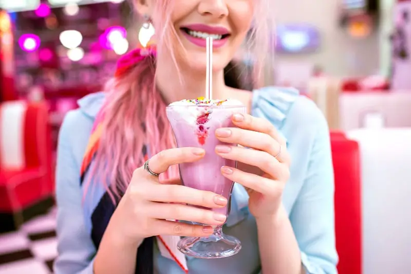 Cute pretty sensual woman with trendy pink hairs