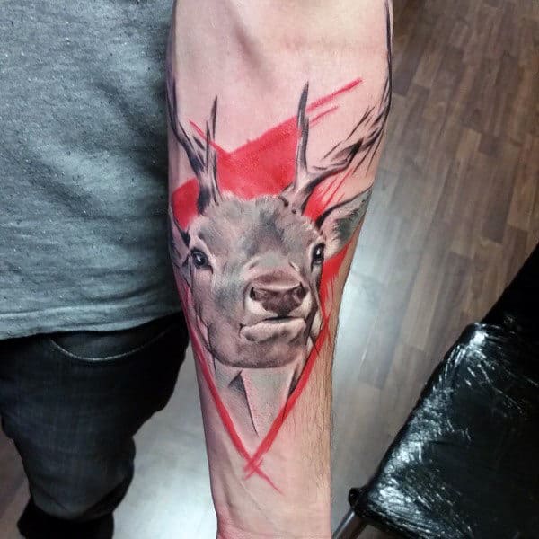 abstract-red-background-mens-deer-head-tattoos-on-inner-forearm