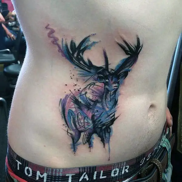 guys-deer-antler-tattoo-designs-on-stomach