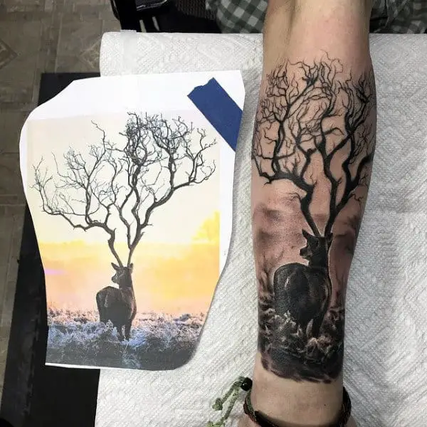 lower-leg-deer-hunting-tattoo-for-guys