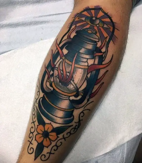 flaming-lantern-with-all-seeing-eye-guys-traditional-back-of-leg-tattoo