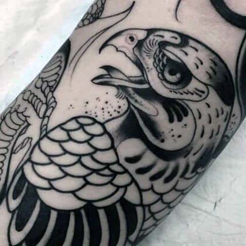 black-ink-guys-falcon-arm-tattoo-design-ideas