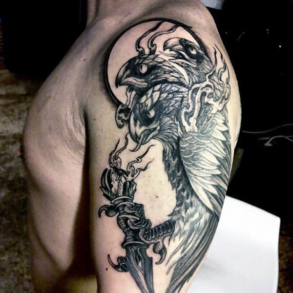 black-ink-three-headed-falcon-guys-upper-arm-tattoos