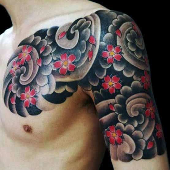 cherry-blossom-flowers-blowing-in-wind-japanese-male-half-sleeve-tattoo
