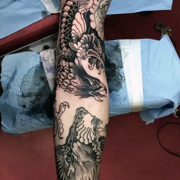 cool-male-dotwork-falcon-forearm-tattoo