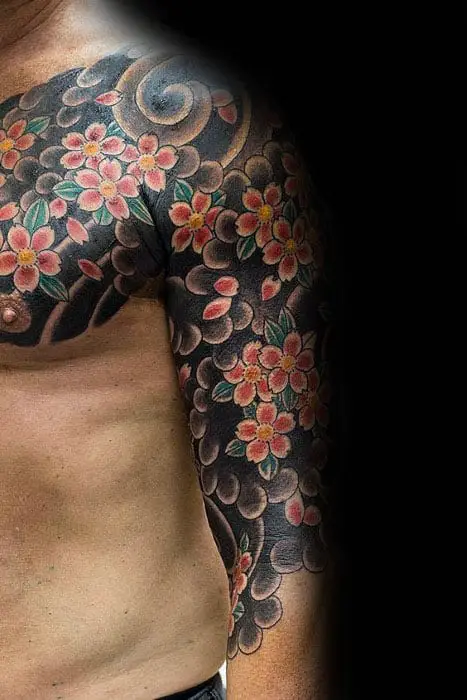 gentleman-with-traditional-half-sleeve-japanese-flower-and-wind-tattoo