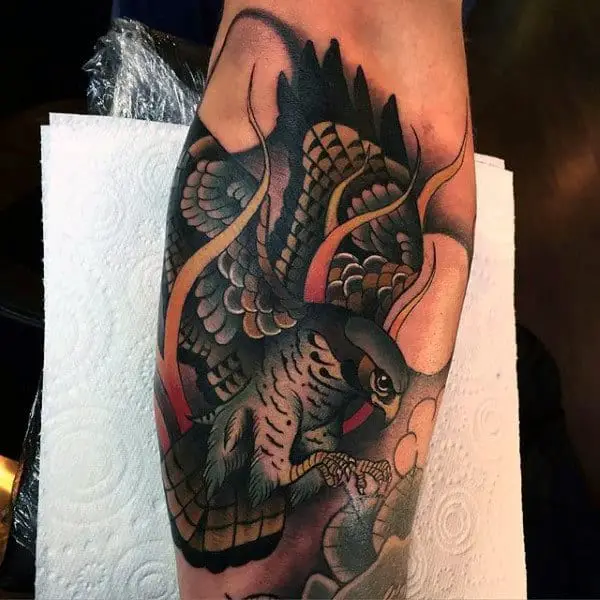 inner-arm-falcon-male-neo-traditional-tattoo-inspiration