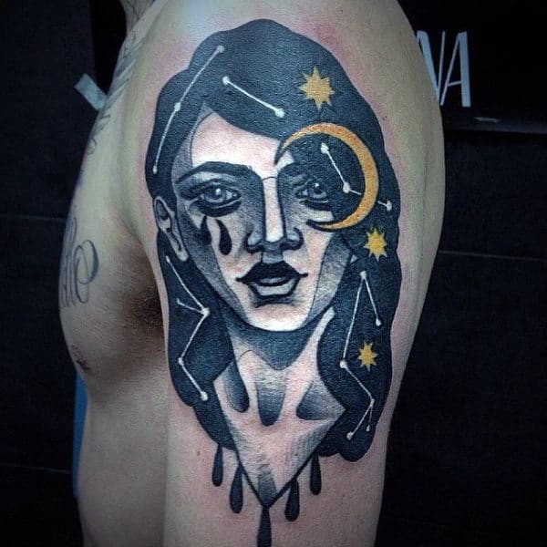 creative-mens-potrait-constellations-upper-arm-tattoo-negative-space