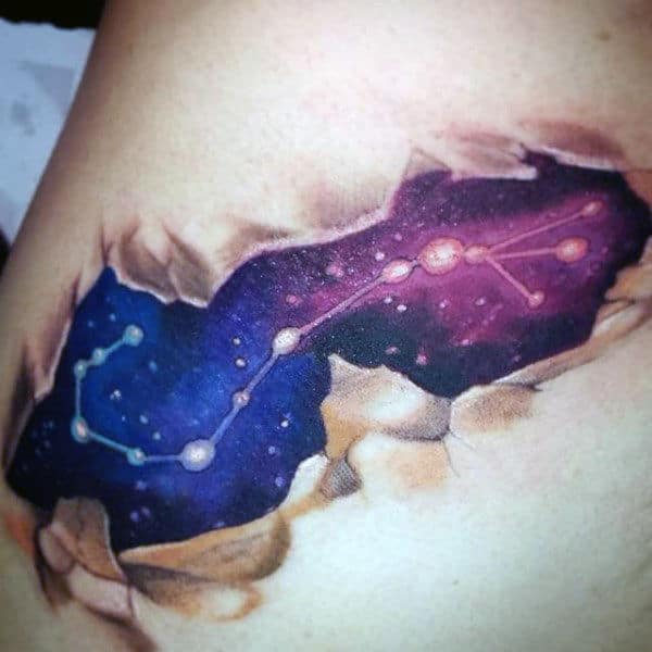 ripped-skin-outer-space-mens-stars-scorpio-shoulder-tattoo-design