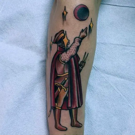 royal-man-star-gazing-at-constellations-mens-forearm-tattoo