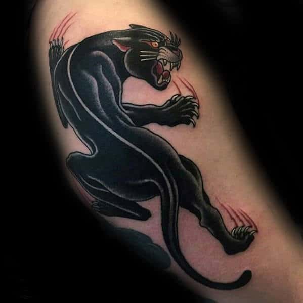 mens-traditional-panther-climbing-on-arm-tattoo