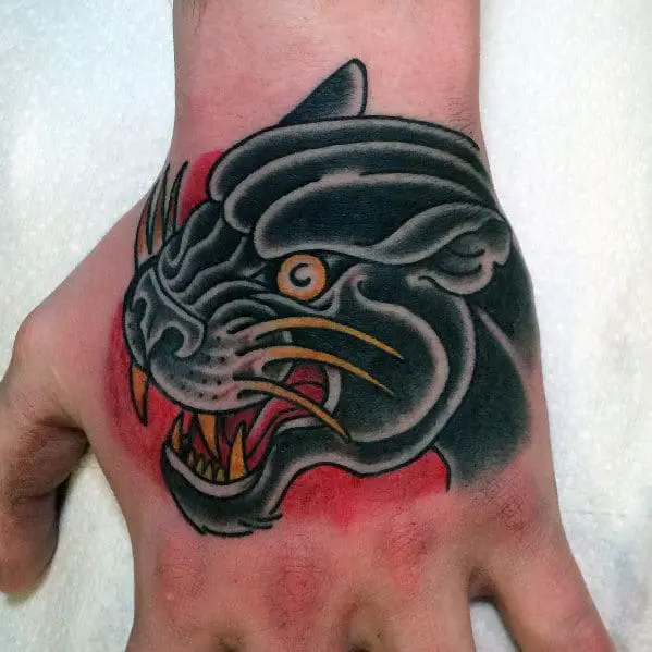 red-and-black-ink-guys-traditional-panther-hand-tattoo
