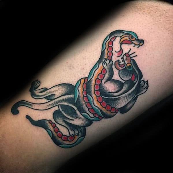 snake-wrapped-around-panther-guys-traditional-arm-tattoos