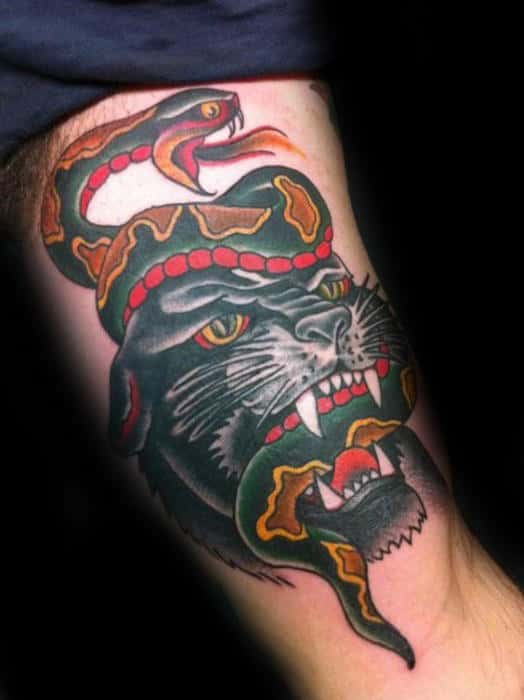 traditional-panther-with-snake-in-mouth-mens-arm-tattoo